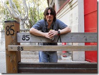 Me posing with a section of Encierro fence. This fence stretches through all of the open areas used in the running of the bulls.