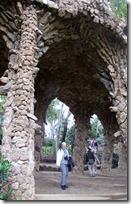 My mother standing in an archway in Park Güell. The rocks were dug up from the immediate vicinity of the park and used in the construction of the park.