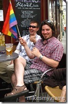 Jeff and I show our pride. The sitting back and drinking beer well away from the parade sort of pride...